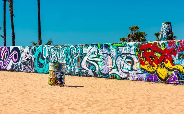 Colorful Graffiti on a wall and barrel at Venice Beach in Los Angeles, California — Stock Photo, Image