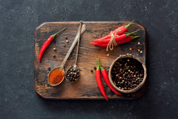 Chilli peppers and assorted dry peppers — Stock Photo, Image