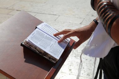 Hebrew Bible at the Wailing Wall in Jerusalem clipart