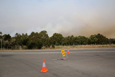 Closed Road near Bicheno at the massive Bush Fire in Tasmania. Australia clipart