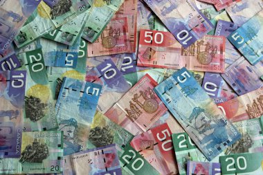 Bir yığın Kanada Doları Banknotları