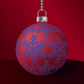 Červené vánoční koule s modré vločky.