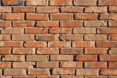 Eski kırmızı tuğla duvarı.