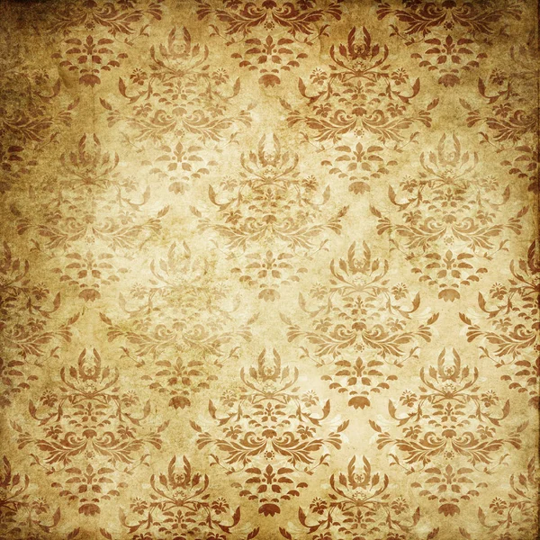 Old yellowed paper background with floral patterns.. — Stock Photo, Image