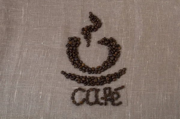 Grains de café torréfiés, lin, le mot café en français, café, carte, tasse de café, en espagnol , — Photo