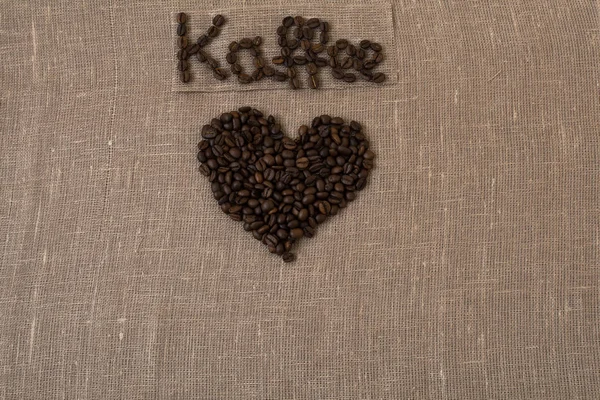 Grains de café torréfiés, lin, mot de café en allemand, café, salutation, allemand, coeur , — Photo