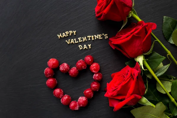Happy Valentine's Day written on the board, cherries in the form of heart — Stock Photo, Image