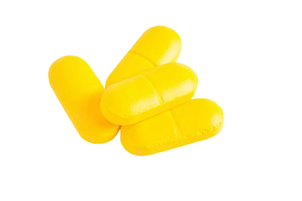 Fechar Pílulas Amarelas Isoladas Fundo Branco — Fotografia de Stock