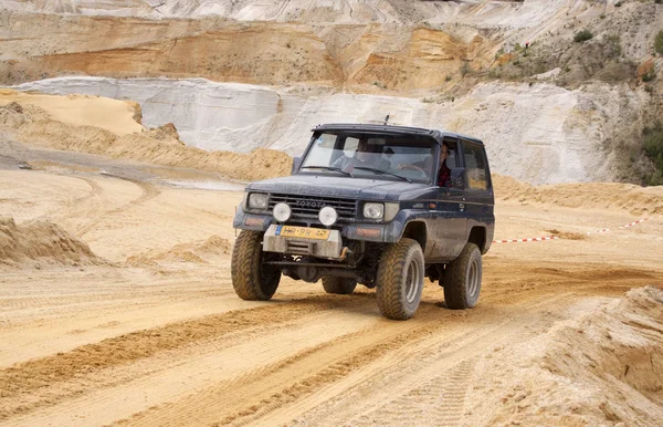 Exciting off road drivig in a sand winning pit — Stock Photo, Image