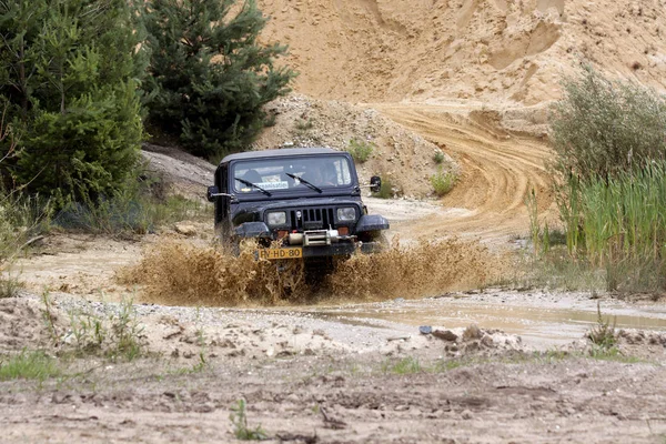 Exciting off road drivig in a sand winning pit — Stock Photo, Image