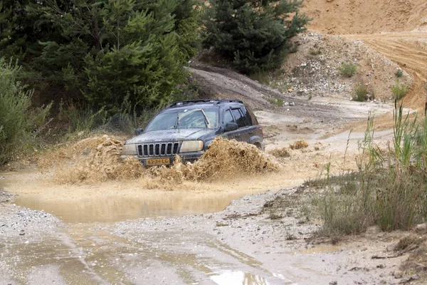 Exciting off road drivig in a sand winning pit — Stock Photo, Image