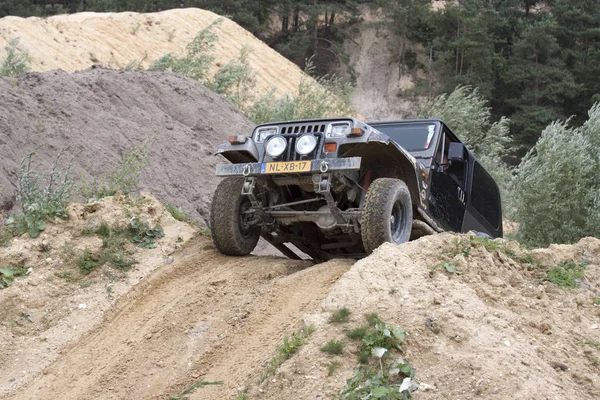 Exciting off road drivig in a sand winning pit — Stock Photo, Image