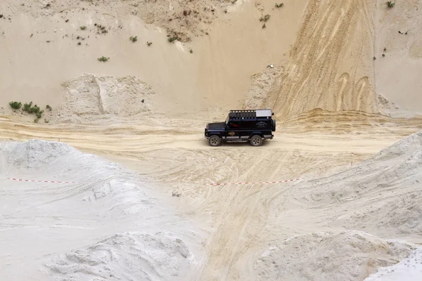 Exciting off road drivig in a sand winning pit — Stock Photo, Image