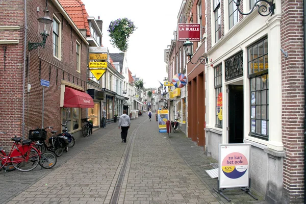 Prominentní nákupní ulice zvané Slijkstraat — Stock fotografie