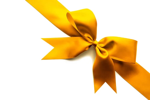 Gold ribbon and bow — Stock Photo, Image