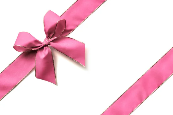 Pink ribbon and bow — Stock Photo, Image