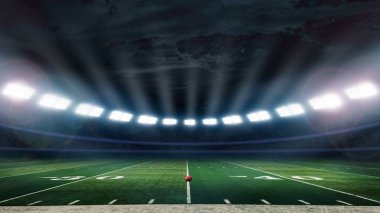 Stadyum ışıkları arka plan ile futbol sahası