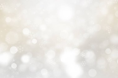 Kar taneleriyle altın Noel arkaplanı