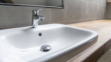sink and faucet in bathroom clipart