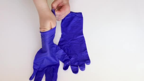 Doctor Nurse Putting Blue Medical Latex Gloves Close — Stock Video