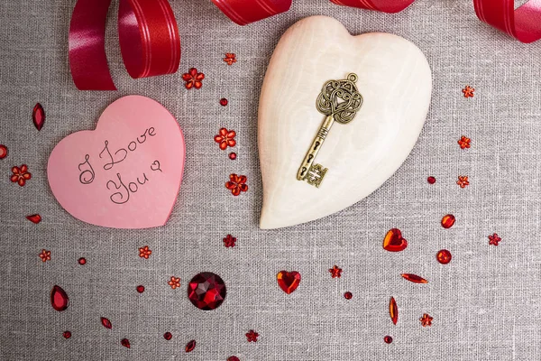 The wooden heart with red sequins decoration — Stock Photo, Image