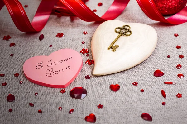 The wooden heart with red sequins decoration — Stock Photo, Image