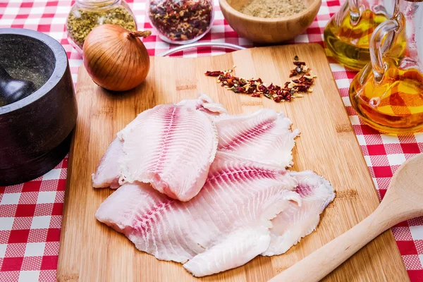 Fresh raw fillet of tilapia fish — Stock Photo, Image