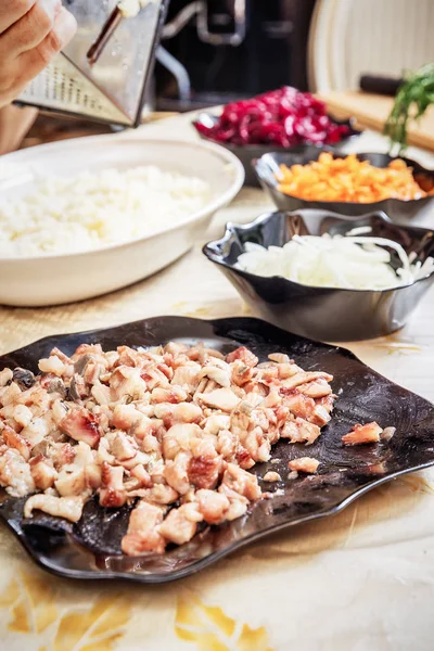 Preparing russian traditional salad herring under fur coat — Stock Photo, Image