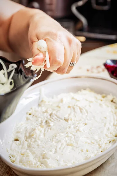 Preparing russian traditional salad herring under fur coat — Stock Photo, Image