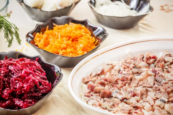 Preparing russian traditional salad herring under fur coat — Stock Photo, Image