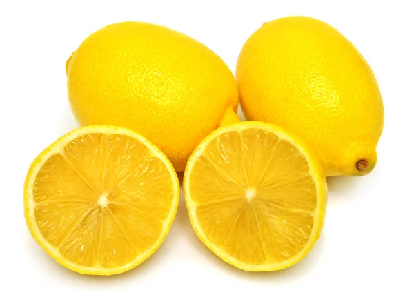 Tropical ripe lemons with slices — Stock Photo, Image