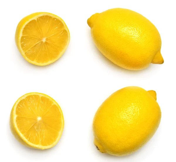 Τροπικών ώριμων λεμόνια με φέτες Εικόνα Αρχείου