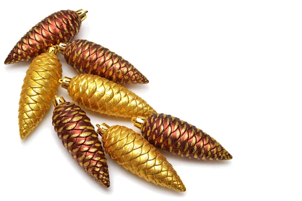 Creative christmas composition of pine cones toys isolated on wh — 스톡 사진