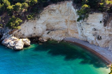 Summer beach Cala di Porto Greco, Gargano, Puglia, Italy