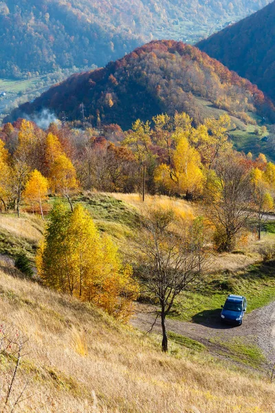 Dirty secondary road in autumn Carpathian mountain, Ukraine — Stock Photo, Image