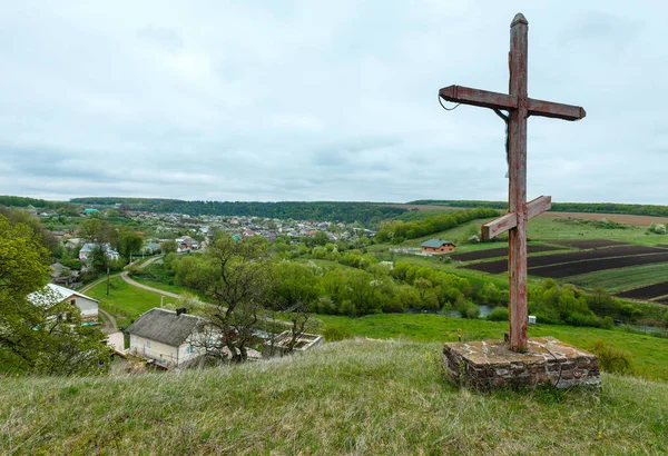 Wooden cross near spring Rukomysh Cave temple, Ternopil Region,