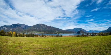 Peaceful autumn Alps mountain lake shore view. Wolfgangsee lake,