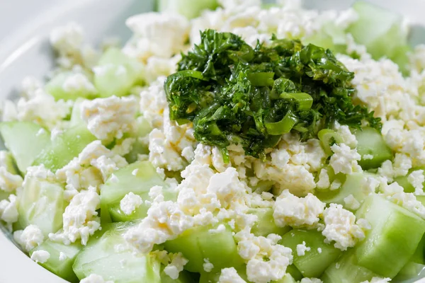 Cucumber and feta cheese salad — Stock Photo, Image