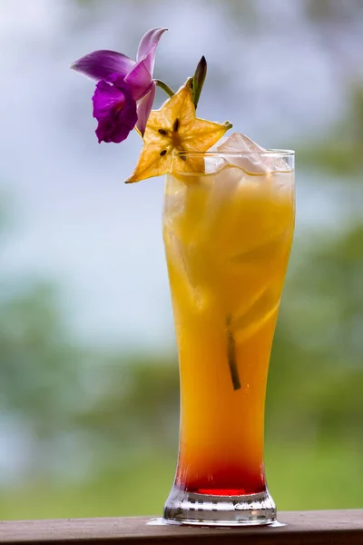 Tequila sunrise served outdoors — Stock Photo, Image