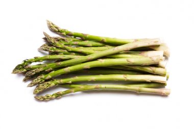 asparagus spears over white  clipart