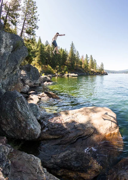 Jumping to the lake — ストック写真