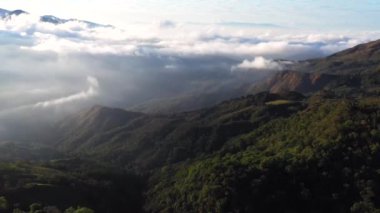 Early morning fog clinging to the mountain range in the rural south of Costa Rica
