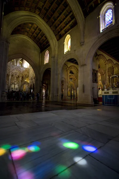 Stained glass reflections on floor of mosque-cathedral of Cordoba — Stock Photo, Image