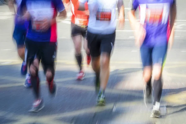 Movimento turvo do grupo de corredores de maratona — Fotografia de Stock