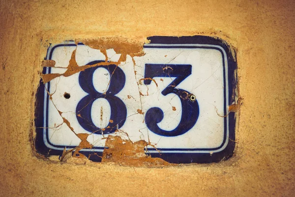 Number Eighty Three Enamel Door Number Plaster Wall — Stock Photo, Image