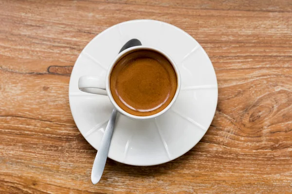 Espresso cup on wooden table — Stock Photo, Image