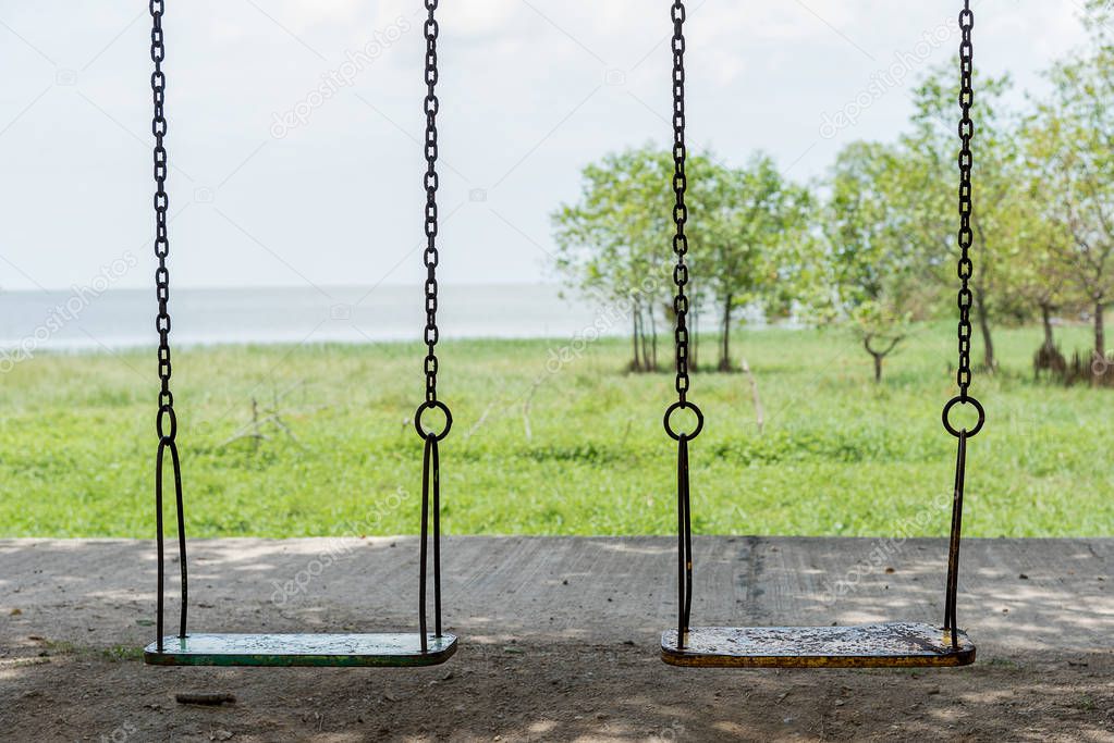 Empty chain swing in playground