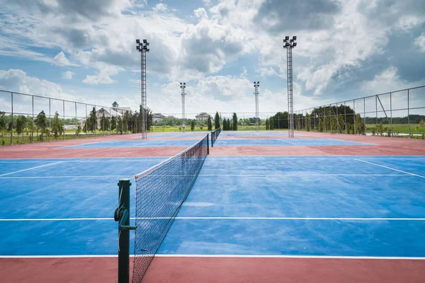 Tennis court empty in countryside Stock Image