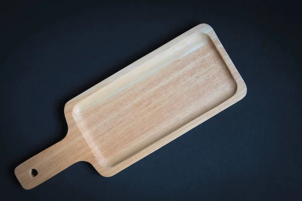 Placa de madeira na mesa de madeira — Fotografia de Stock