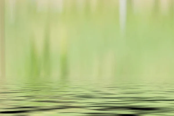 Desenfoque de fondo con reflejo de agua — Foto de Stock